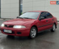 Красный Мицубиси Харизма, объемом двигателя 1.84 л и пробегом 172 тыс. км за 2990 $, фото 2 на Automoto.ua