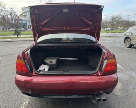 Красный Мицубиси Харизма, объемом двигателя 1.8 л и пробегом 257 тыс. км за 3100 $, фото 14 на Automoto.ua