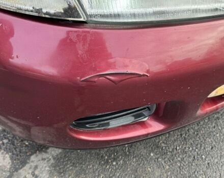 Красный Мицубиси Харизма, объемом двигателя 1.8 л и пробегом 257 тыс. км за 3100 $, фото 18 на Automoto.ua