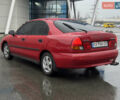 Красный Мицубиси Харизма, объемом двигателя 1.84 л и пробегом 140 тыс. км за 3400 $, фото 5 на Automoto.ua