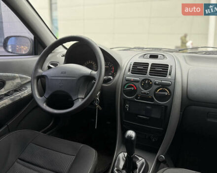 Красный Мицубиси Харизма, объемом двигателя 1.84 л и пробегом 172 тыс. км за 2990 $, фото 11 на Automoto.ua