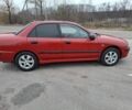 Красный Мицубиси Харизма, объемом двигателя 1.6 л и пробегом 310 тыс. км за 3199 $, фото 2 на Automoto.ua
