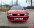 Червоний Міцубісі Харизма, об'ємом двигуна 16 л та пробігом 300 тис. км за 4150 $, фото 1 на Automoto.ua