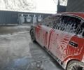Красный Мицубиси Харизма, объемом двигателя 0.16 л и пробегом 100 тыс. км за 1850 $, фото 1 на Automoto.ua