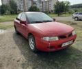 Красный Мицубиси Харизма, объемом двигателя 1.8 л и пробегом 310 тыс. км за 994 $, фото 4 на Automoto.ua