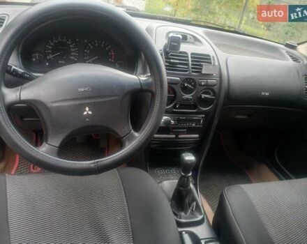 Міцубісі Харизма 1996 у Кролевце на Automoto.ua Червоний Міцубісі Харизма, об'ємом двигуна 1.6 л та пробігом 340 тис. км за 1700 $, фото 2 на Automoto.ua