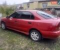 Міцубісі Харизма 1996 у Кролевце на Automoto.ua Червоний Міцубісі Харизма, об'ємом двигуна 1.6 л та пробігом 340 тис. км за 1700 $, фото 9 на Automoto.ua
