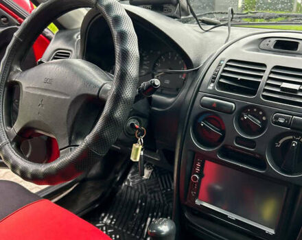Червоний Міцубісі Харизма, об'ємом двигуна 1.6 л та пробігом 347 тис. км за 1700 $, фото 14 на Automoto.ua