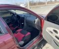 Красный Мицубиси Харизма, объемом двигателя 1.6 л и пробегом 340 тыс. км за 2400 $, фото 5 на Automoto.ua