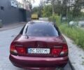 Красный Мицубиси Харизма, объемом двигателя 1.6 л и пробегом 340 тыс. км за 2400 $, фото 1 на Automoto.ua