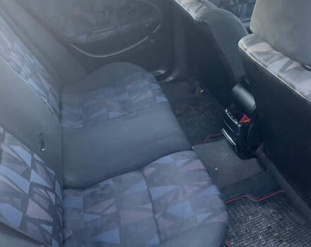 Красный Мицубиси Харизма, объемом двигателя 1.9 л и пробегом 350 тыс. км за 3000 $, фото 8 на Automoto.ua