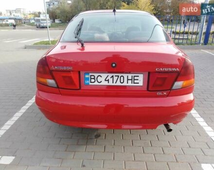 Красный Мицубиси Харизма, объемом двигателя 1.6 л и пробегом 270 тыс. км за 3000 $, фото 12 на Automoto.ua