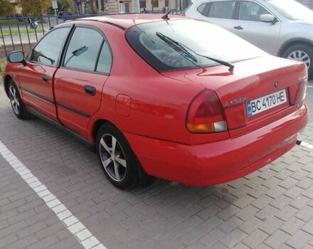 Красный Мицубиси Харизма, объемом двигателя 1.6 л и пробегом 270 тыс. км за 3000 $, фото 10 на Automoto.ua
