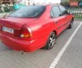 Красный Мицубиси Харизма, объемом двигателя 1.6 л и пробегом 270 тыс. км за 3000 $, фото 7 на Automoto.ua