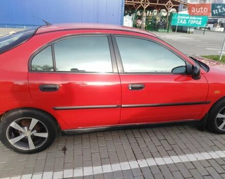 Красный Мицубиси Харизма, объемом двигателя 1.6 л и пробегом 270 тыс. км за 3000 $, фото 9 на Automoto.ua