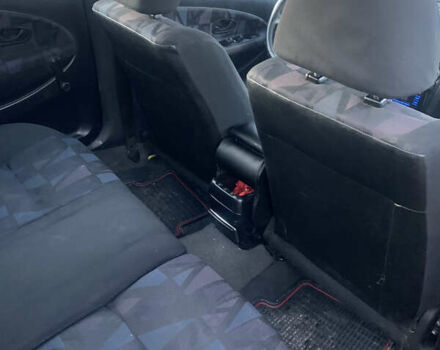 Красный Мицубиси Харизма, объемом двигателя 1.9 л и пробегом 350 тыс. км за 3000 $, фото 12 на Automoto.ua