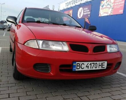 Красный Мицубиси Харизма, объемом двигателя 1.6 л и пробегом 270 тыс. км за 3000 $, фото 15 на Automoto.ua