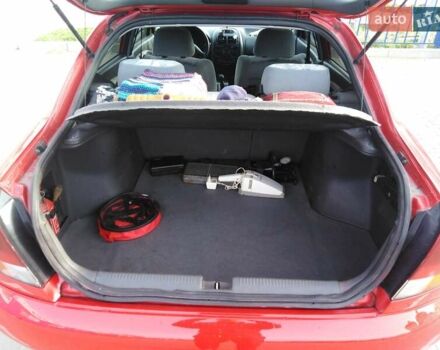 Красный Мицубиси Харизма, объемом двигателя 1.6 л и пробегом 270 тыс. км за 3000 $, фото 16 на Automoto.ua