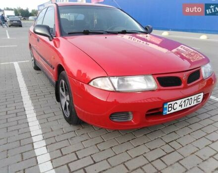 Красный Мицубиси Харизма, объемом двигателя 1.6 л и пробегом 270 тыс. км за 3000 $, фото 14 на Automoto.ua