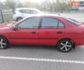 Красный Мицубиси Харизма, объемом двигателя 1.6 л и пробегом 270 тыс. км за 3000 $, фото 3 на Automoto.ua