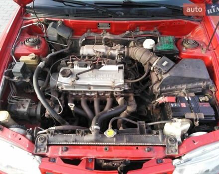Красный Мицубиси Харизма, объемом двигателя 1.6 л и пробегом 270 тыс. км за 3000 $, фото 11 на Automoto.ua