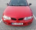 Красный Мицубиси Харизма, объемом двигателя 1.6 л и пробегом 270 тыс. км за 3000 $, фото 1 на Automoto.ua