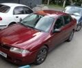Червоний Міцубісі Харизма, об'ємом двигуна 1.8 л та пробігом 193 тис. км за 3900 $, фото 1 на Automoto.ua