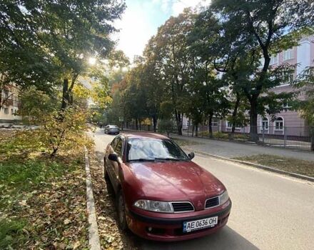 Красный Мицубиси Харизма, объемом двигателя 1.6 л и пробегом 450 тыс. км за 3000 $, фото 3 на Automoto.ua