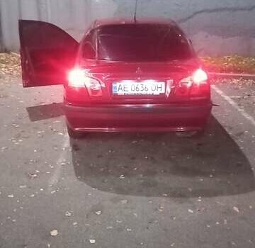 Красный Мицубиси Харизма, объемом двигателя 1.6 л и пробегом 450 тыс. км за 3000 $, фото 9 на Automoto.ua