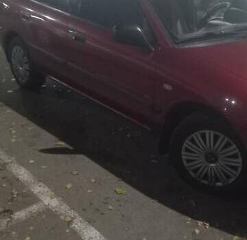 Красный Мицубиси Харизма, объемом двигателя 1.6 л и пробегом 450 тыс. км за 3000 $, фото 5 на Automoto.ua