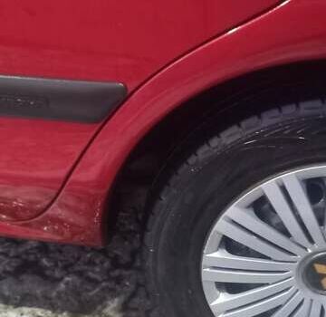 Красный Мицубиси Харизма, объемом двигателя 1.6 л и пробегом 450 тыс. км за 3000 $, фото 14 на Automoto.ua