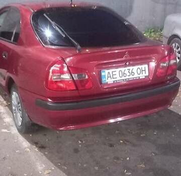 Красный Мицубиси Харизма, объемом двигателя 1.6 л и пробегом 450 тыс. км за 3000 $, фото 8 на Automoto.ua