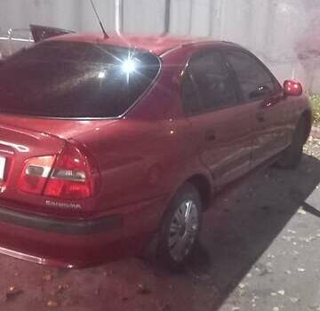 Красный Мицубиси Харизма, объемом двигателя 1.6 л и пробегом 450 тыс. км за 3000 $, фото 6 на Automoto.ua