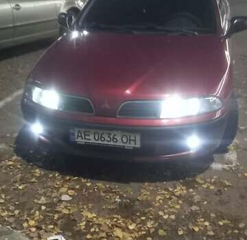 Красный Мицубиси Харизма, объемом двигателя 1.6 л и пробегом 450 тыс. км за 3000 $, фото 10 на Automoto.ua