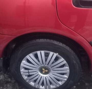 Красный Мицубиси Харизма, объемом двигателя 1.6 л и пробегом 450 тыс. км за 3000 $, фото 11 на Automoto.ua