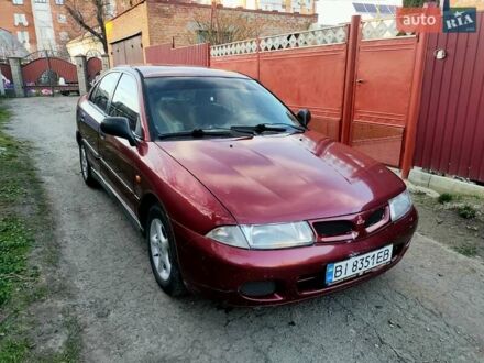 Міцубісі Харизма 1996 у Лубнах на Automoto.ua Червоний Міцубісі Харизма, об'ємом двигуна 1.6 л та пробігом 352 тис. км за 2000 $, фото 1 на Automoto.ua