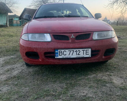 Червоний Міцубісі Харизма, об'ємом двигуна 1.9 л та пробігом 350 тис. км за 3000 $, фото 1 на Automoto.ua