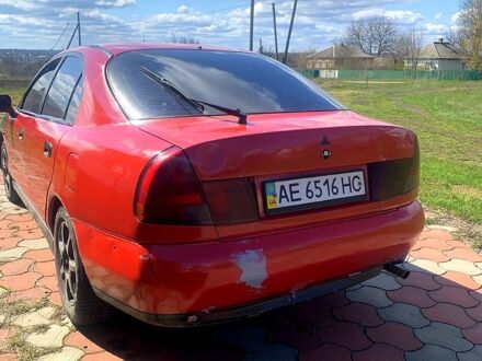 Міцубісі Харизма 1998 у Новоукраинке на Automoto.ua Червоний Міцубісі Харизма, об'ємом двигуна 1.7 л та пробігом 300 тис. км за 2000 $, фото 1 на Automoto.ua