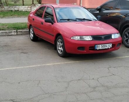 Червоний Міцубісі Харизма, об'ємом двигуна 1.6 л та пробігом 360 тис. км за 1600 $, фото 1 на Automoto.ua