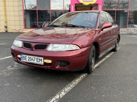 Червоний Міцубісі Харизма, об'ємом двигуна 1.8 л та пробігом 257 тис. км за 3100 $, фото 1 на Automoto.ua