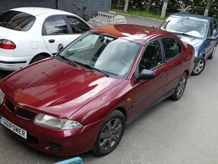 Міцубісі Харизма 1999 у Вышгороде на Automoto.ua Червоний Міцубісі Харизма, об'ємом двигуна 1.8 л та пробігом 193 тис. км за 3900 $, фото 1 на Automoto.ua