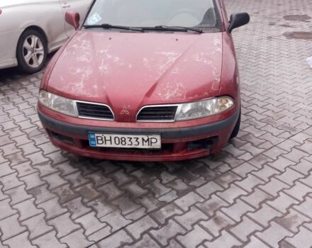 Красный Мицубиси Харизма, объемом двигателя 1.6 л и пробегом 2 тыс. км за 1900 $, фото 1 на Automoto.ua