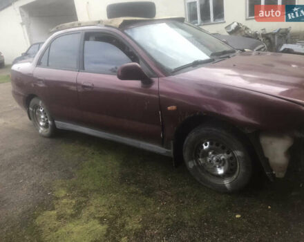 Мицубиси Харизма, объемом двигателя 1.8 л и пробегом 213 тыс. км за 450 $, фото 3 на Automoto.ua