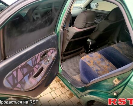 Міцубісі Харизма, об'ємом двигуна 1.8 л та пробігом 255 тис. км за 3500 $, фото 8 на Automoto.ua