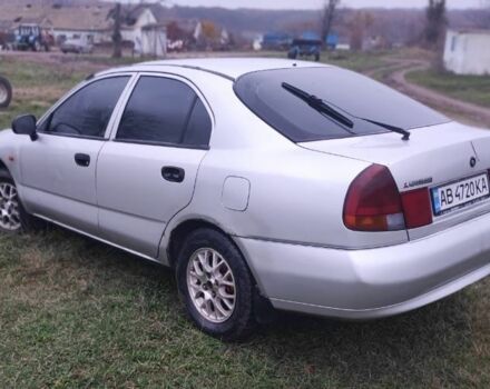 Серый Мицубиси Харизма, объемом двигателя 1.6 л и пробегом 1 тыс. км за 1400 $, фото 2 на Automoto.ua