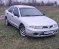 Серый Мицубиси Харизма, объемом двигателя 1.6 л и пробегом 1 тыс. км за 1400 $, фото 1 на Automoto.ua