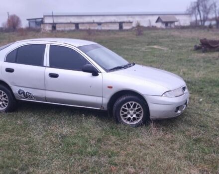 Серый Мицубиси Харизма, объемом двигателя 1.6 л и пробегом 1 тыс. км за 1400 $, фото 3 на Automoto.ua