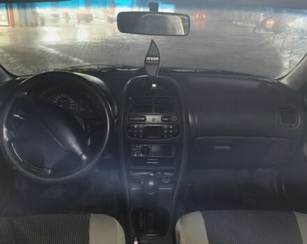 Серый Мицубиси Харизма, объемом двигателя 1.8 л и пробегом 350 тыс. км за 1500 $, фото 6 на Automoto.ua