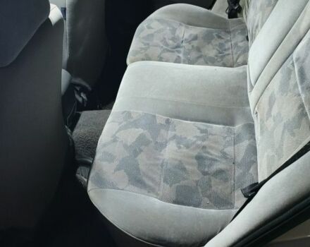 Серый Мицубиси Харизма, объемом двигателя 1.8 л и пробегом 350 тыс. км за 1500 $, фото 7 на Automoto.ua