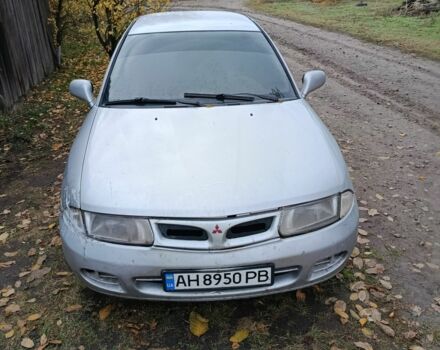 Сірий Міцубісі Харизма, об'ємом двигуна 1.8 л та пробігом 250 тис. км за 1207 $, фото 1 на Automoto.ua